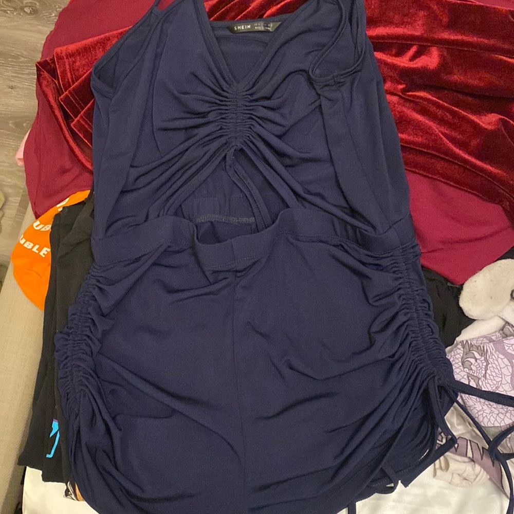 Blue one piece. Very cute